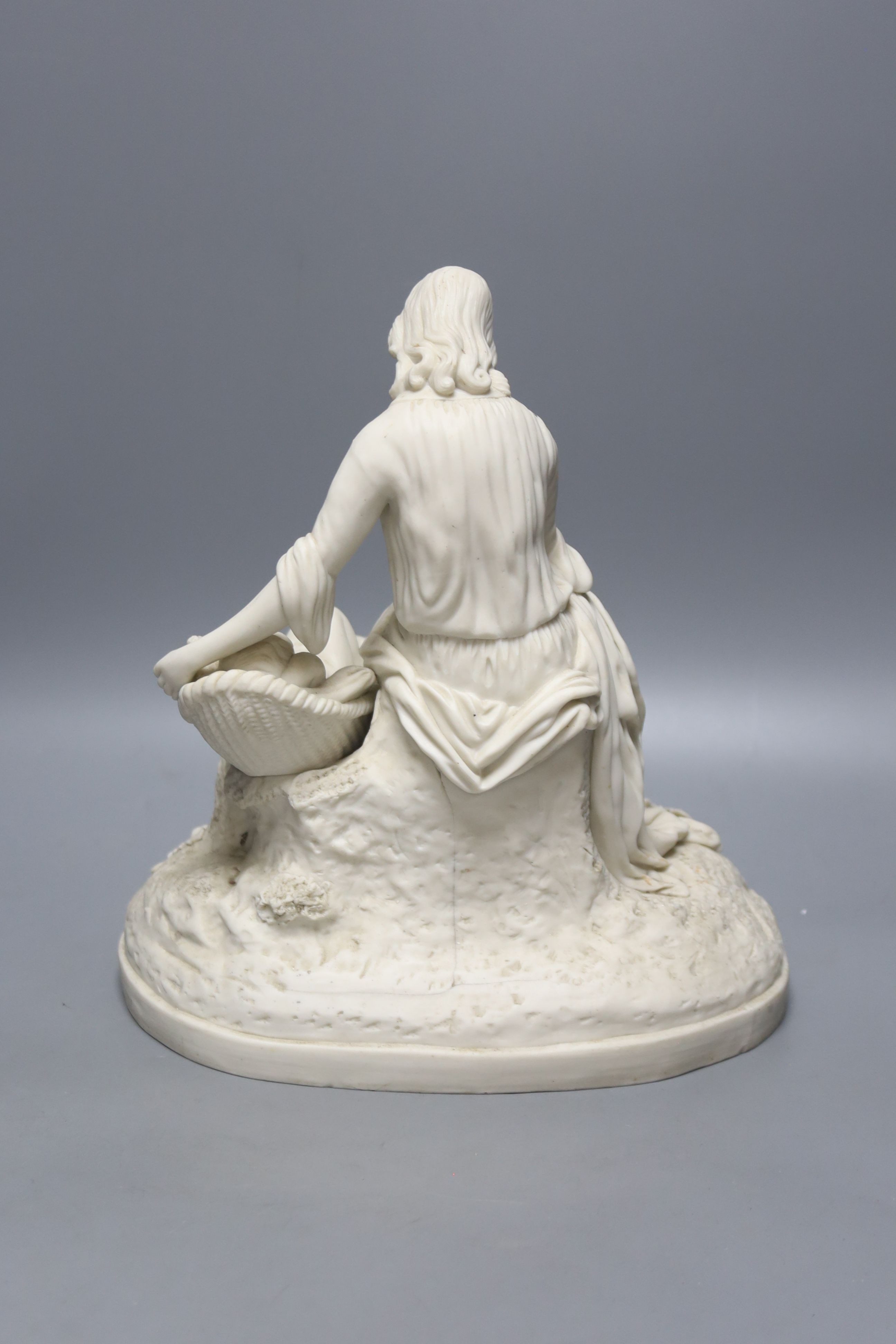 A Parian mother and child group, height 29cm